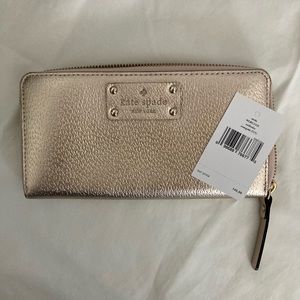 Kate Spade rose gold continental wallet